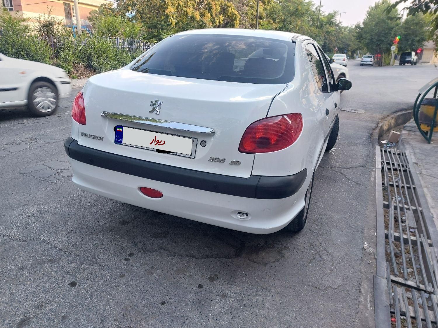 پژو ۲۰۶ صندوق دار v8 - 1397
