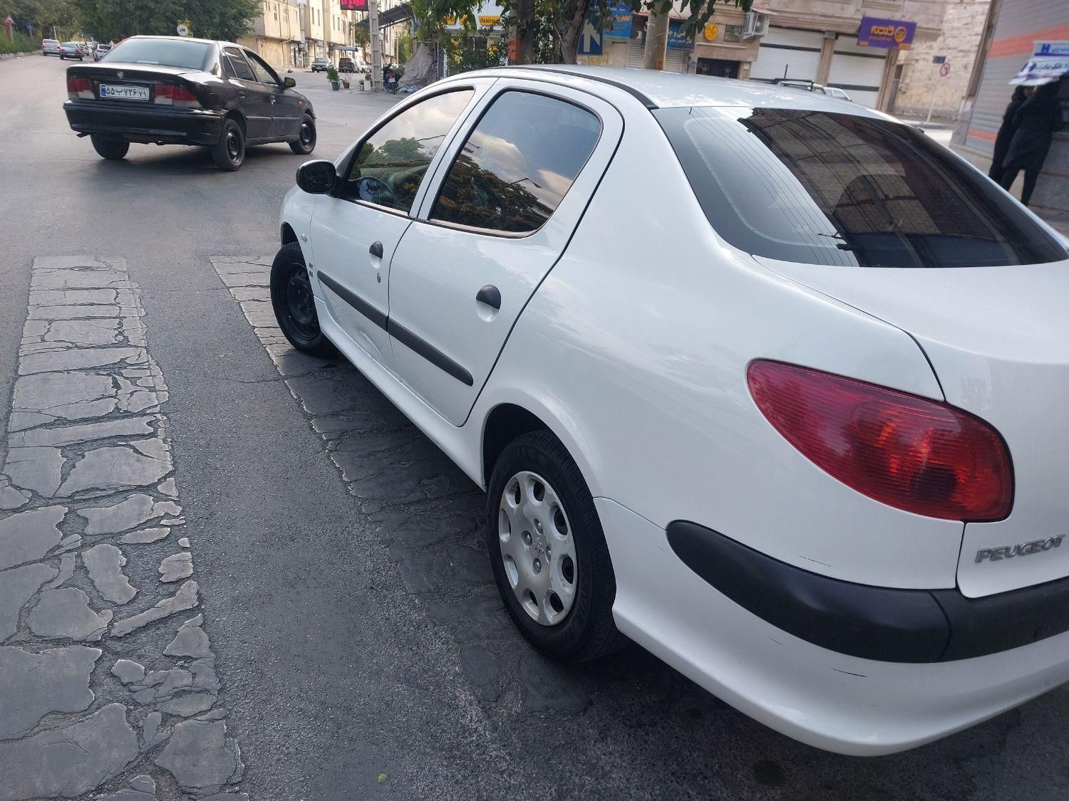 پژو ۲۰۶ صندوق دار v8 - 1397