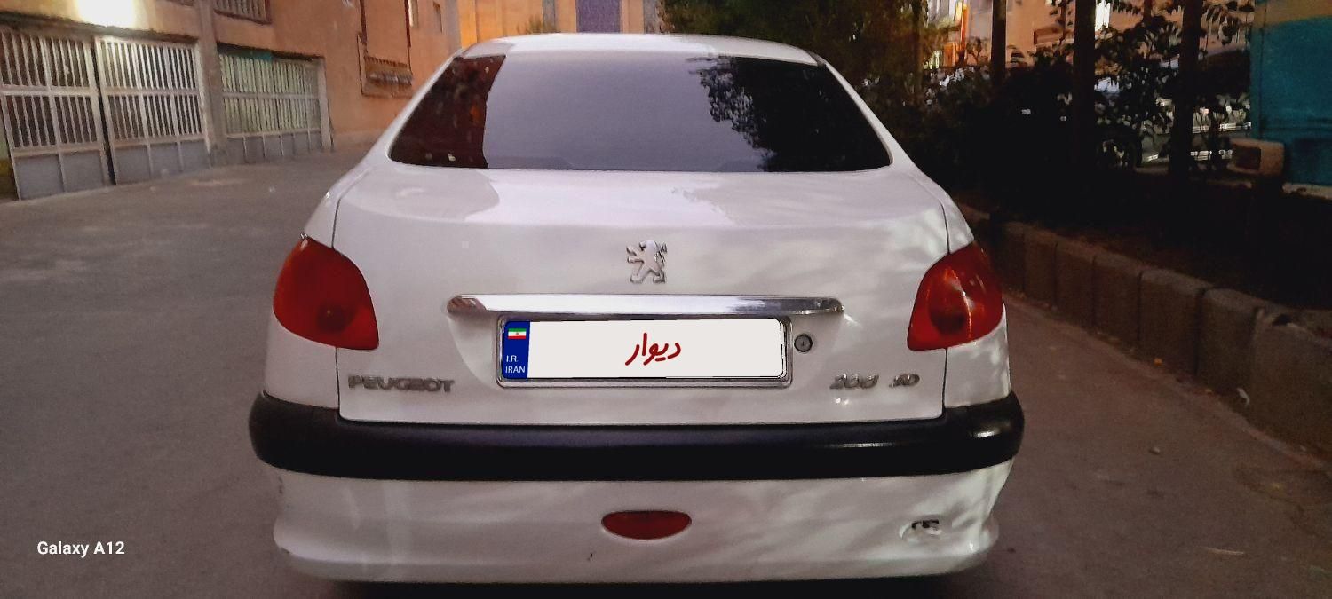پژو ۲۰۶ صندوق دار v8 - 1390