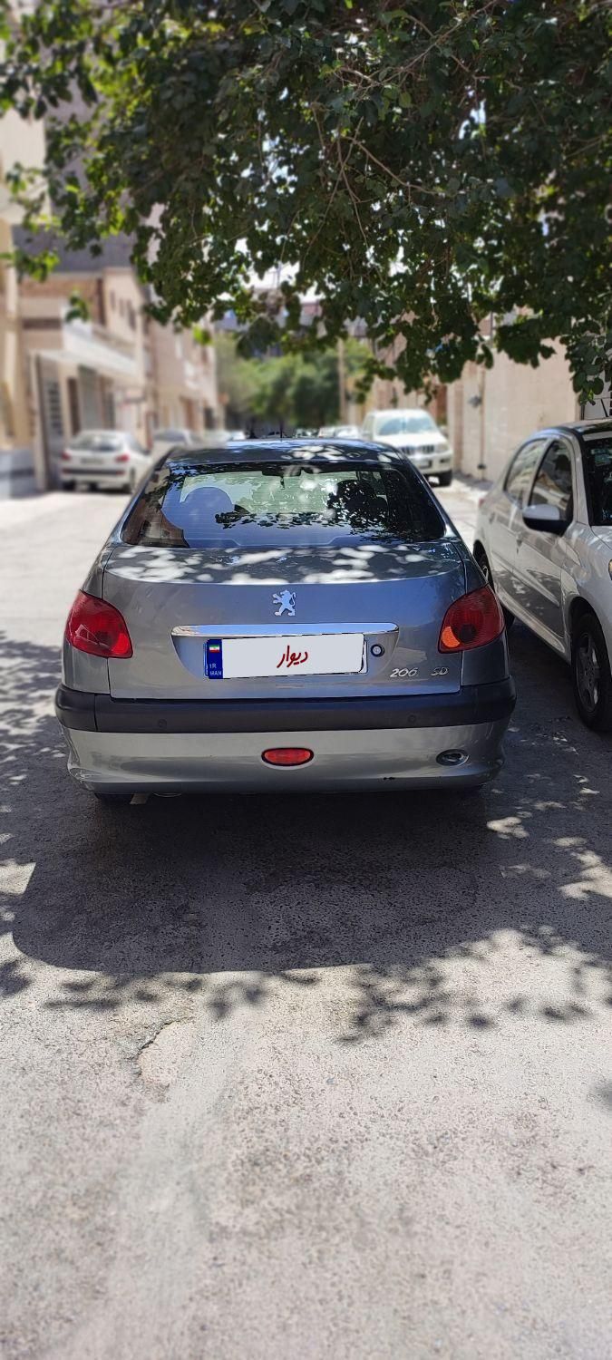 پژو ۲۰۶ صندوق دار v8 - 1395