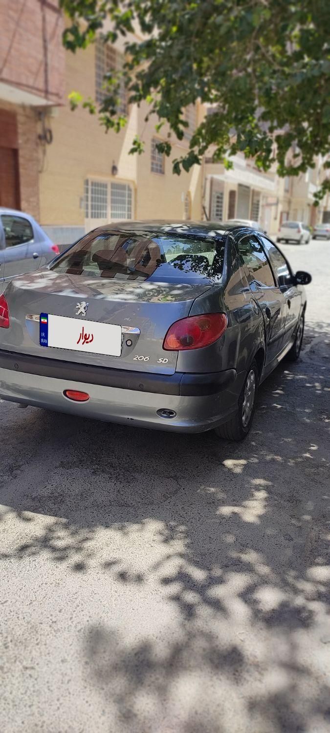 پژو ۲۰۶ صندوق دار v8 - 1395