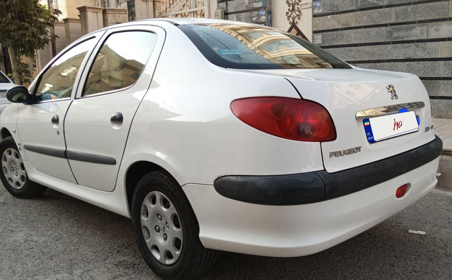 پژو ۲۰۶ صندوق دار v8 - 1396
