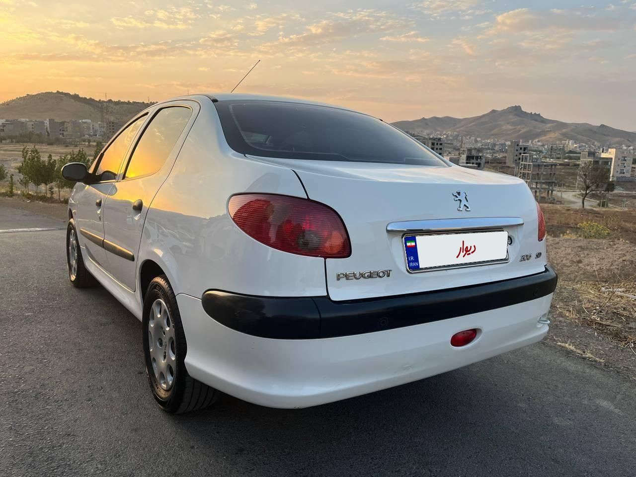 پژو ۲۰۶ صندوق دار v8 - 1395
