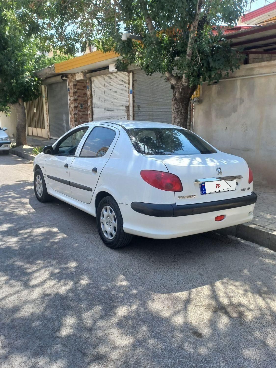 پژو ۲۰۶ صندوق دار v8 - 1396