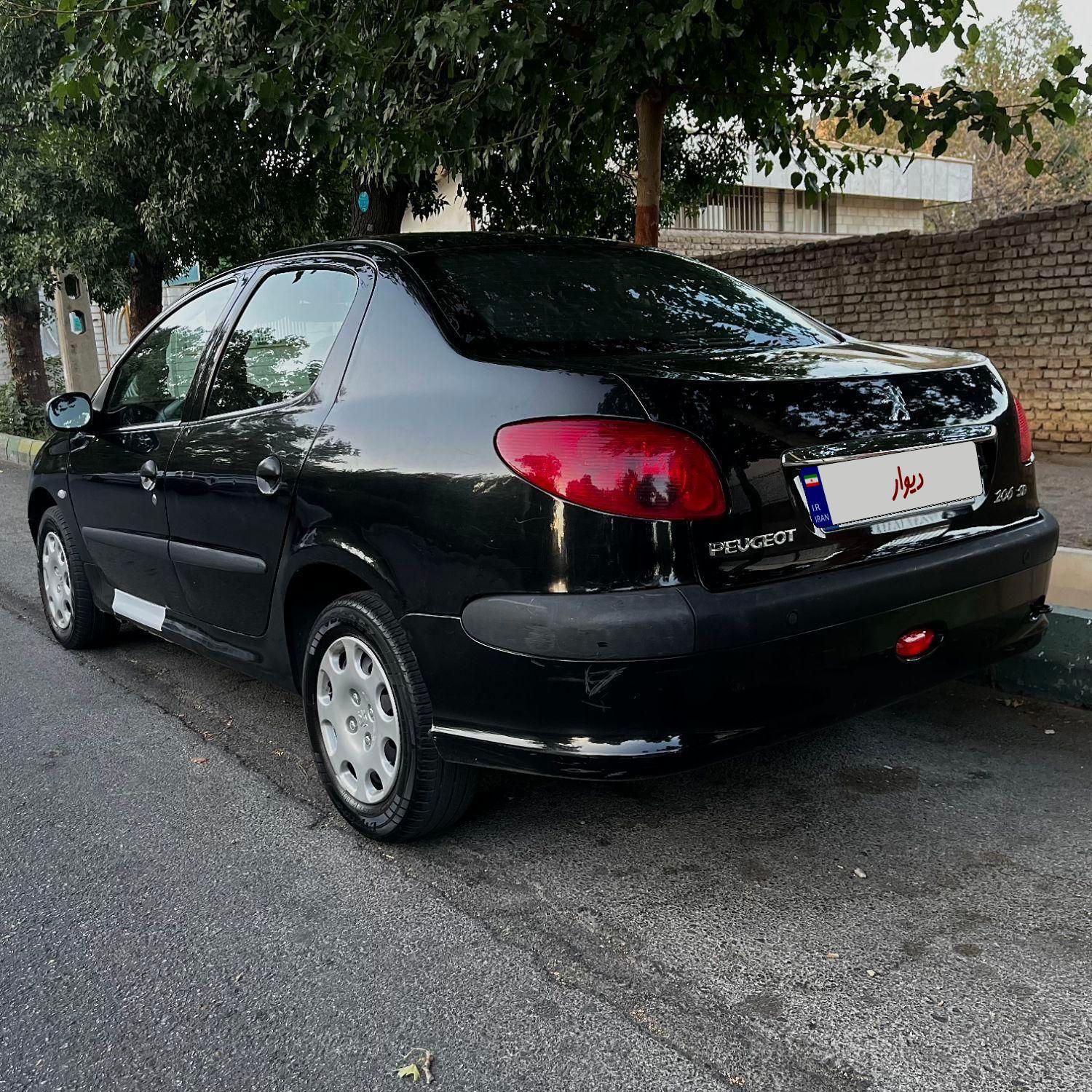 پژو ۲۰۶ صندوق دار v8 - 1395