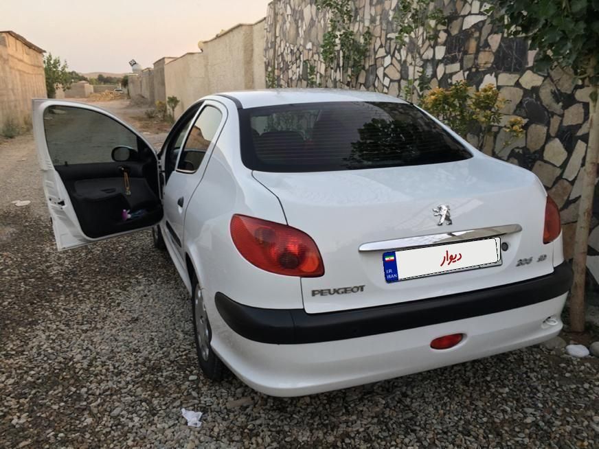 پژو ۲۰۶ صندوق دار v8 - 1396