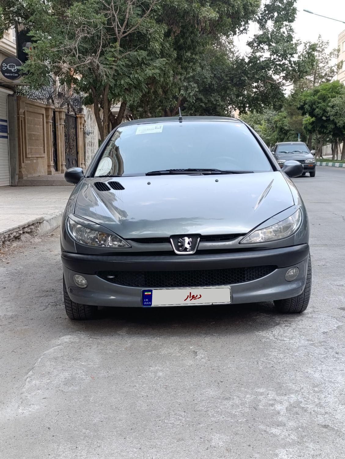 پژو ۲۰۶ صندوق دار v8 - 1396
