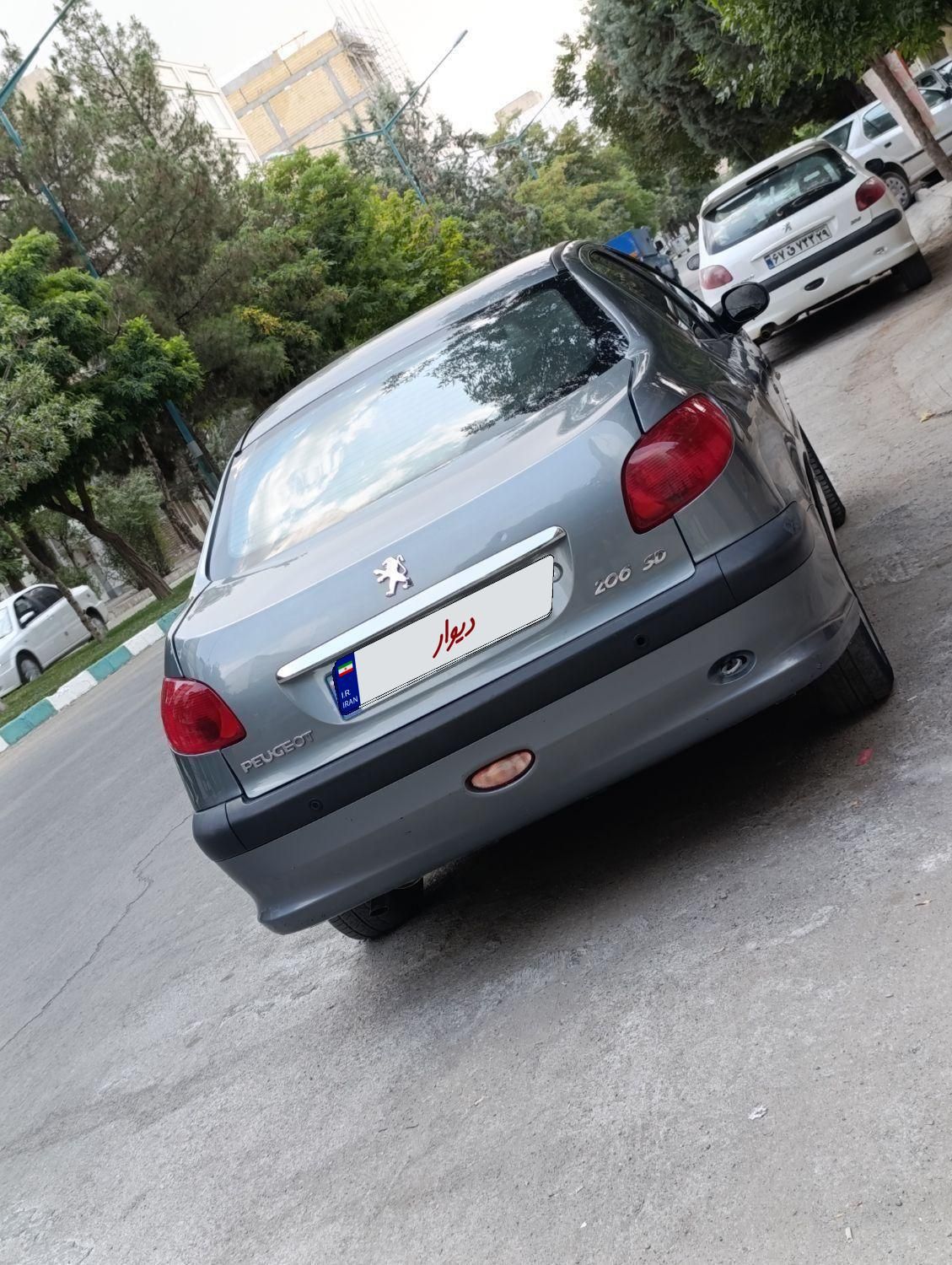 پژو ۲۰۶ صندوق دار v8 - 1396