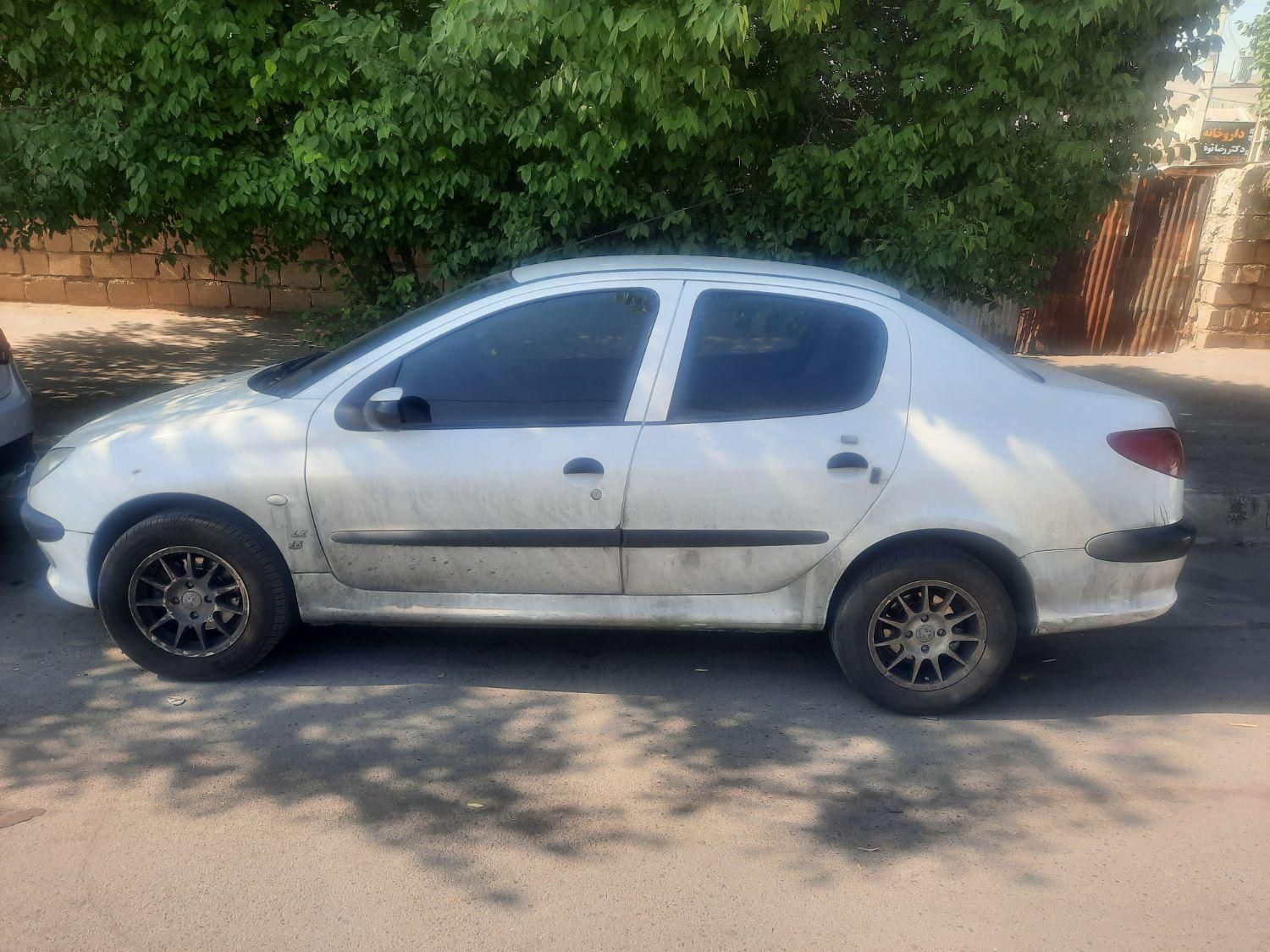 پژو ۲۰۶ صندوق دار v8 - 1396
