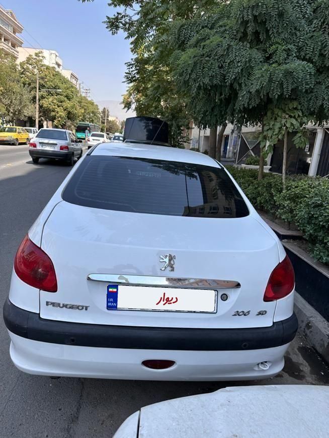 پژو ۲۰۶ صندوق دار v8 - 1396