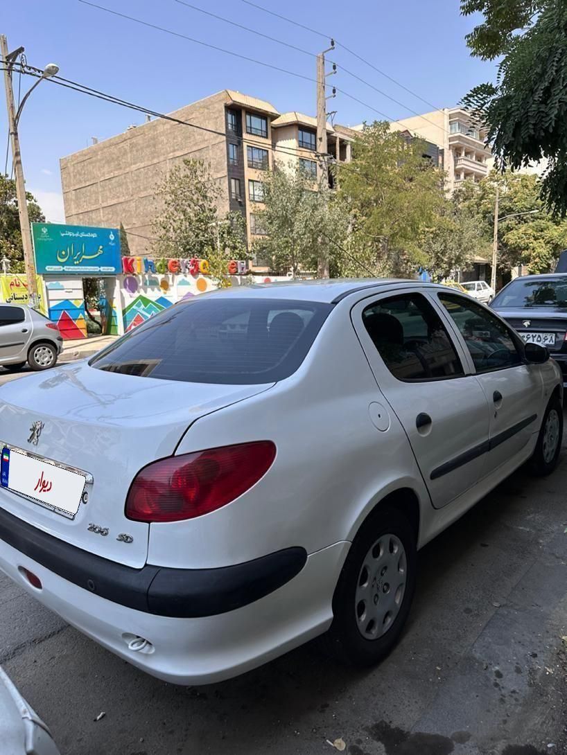 پژو ۲۰۶ صندوق دار v8 - 1396