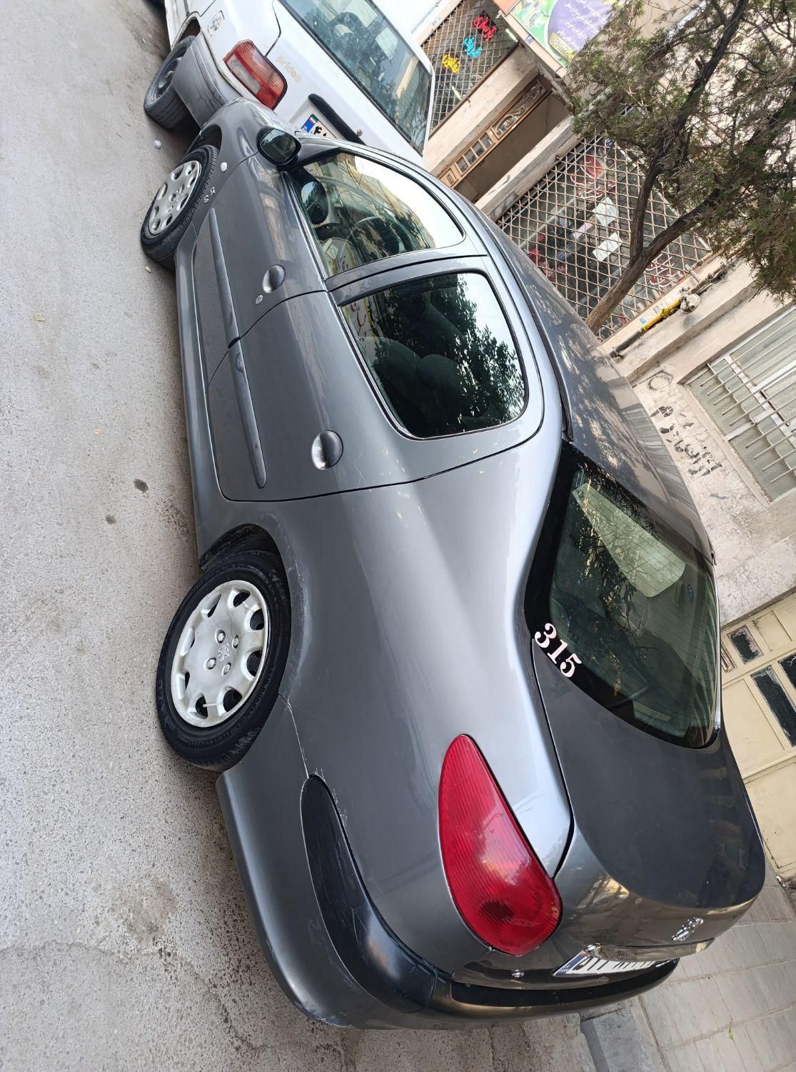 پژو ۲۰۶ صندوق دار v8 - 1392