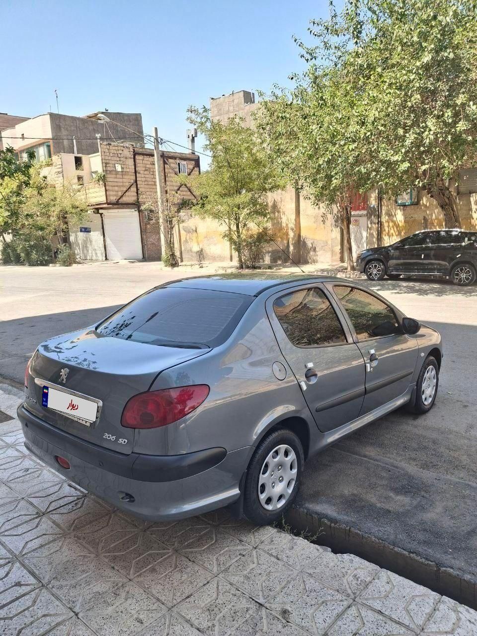 پژو ۲۰۶ صندوق دار v8 - 1396