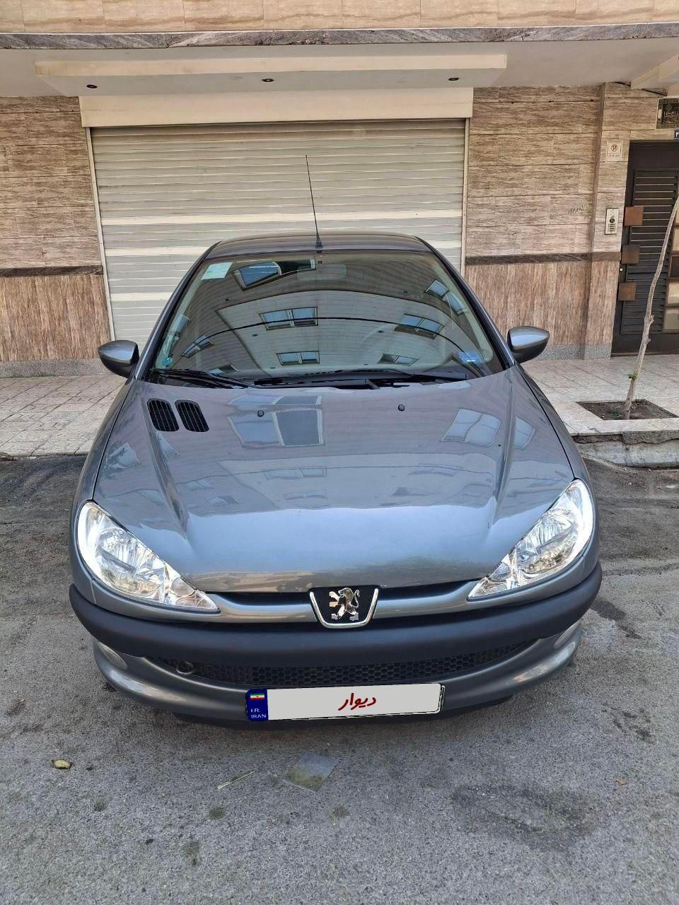 پژو ۲۰۶ صندوق دار v8 - 1396