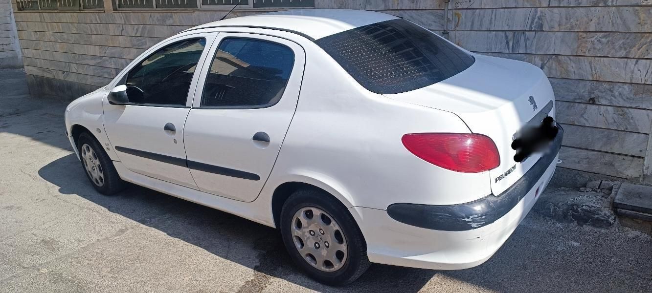پژو ۲۰۶ صندوق دار v8 - 1396