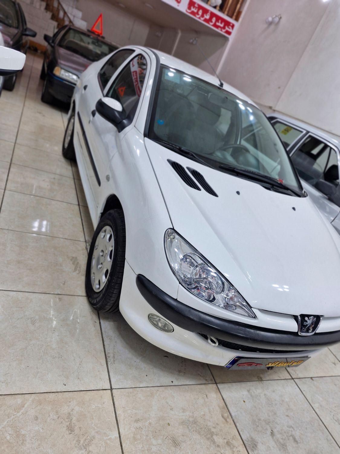 پژو ۲۰۶ صندوق دار v8 - 1397