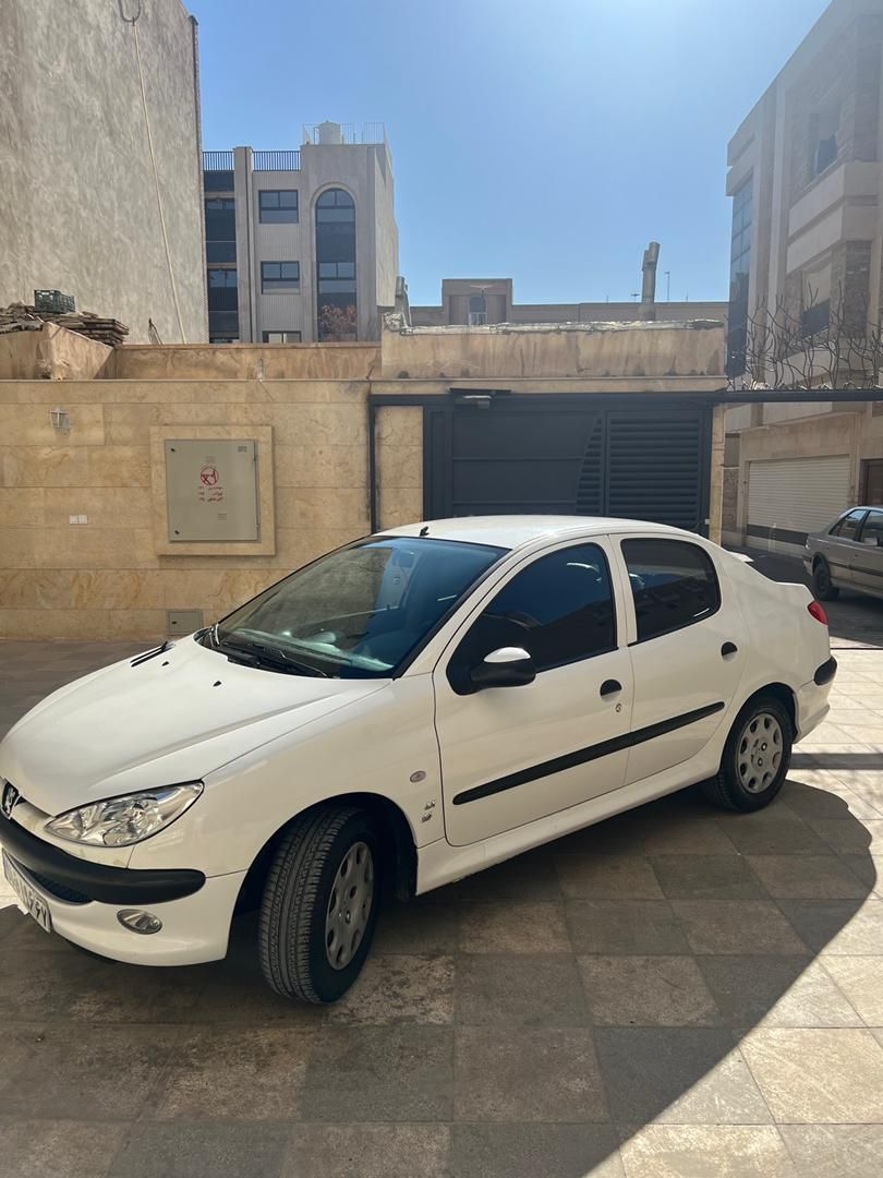 پژو ۲۰۶ صندوق دار v8 - 1396