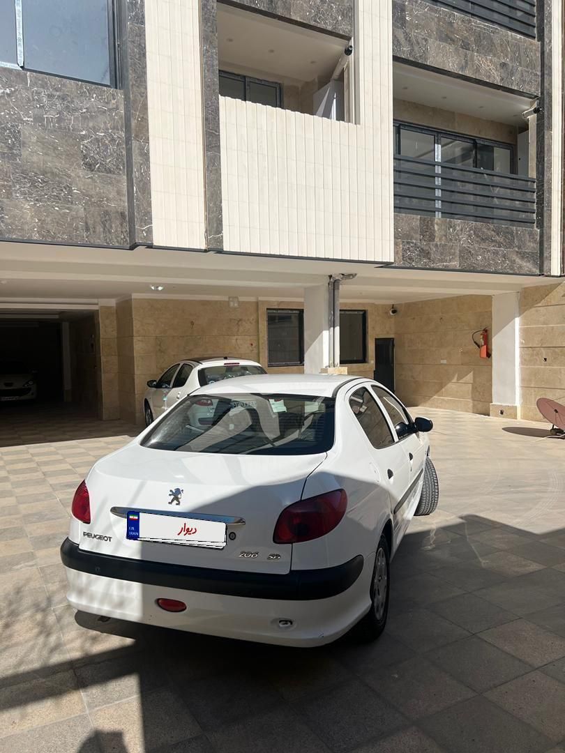 پژو ۲۰۶ صندوق دار v8 - 1396