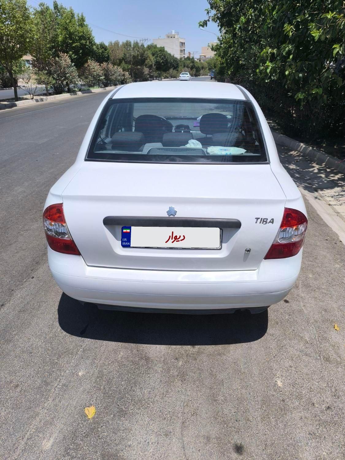 تیبا صندوق دار SX - 1401