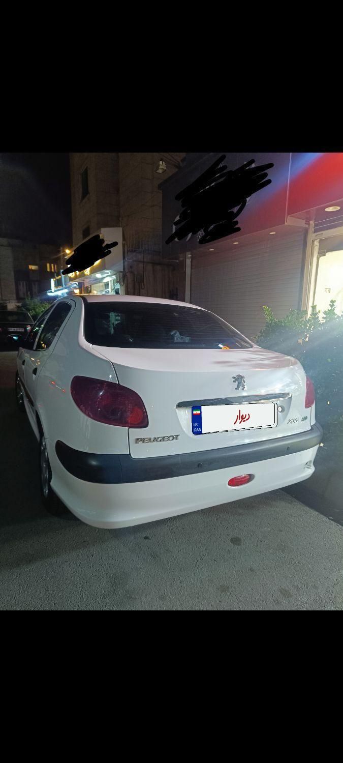 پژو ۲۰۶ صندوق دار v8 - 1399