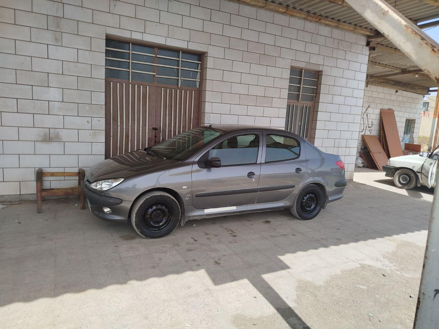 پژو ۲۰۶ صندوق دار v8 - 1394