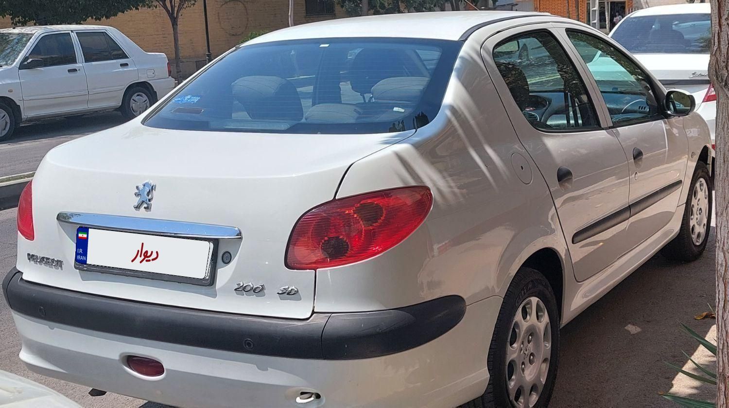 پژو ۲۰۶ صندوق دار v8 - 1395