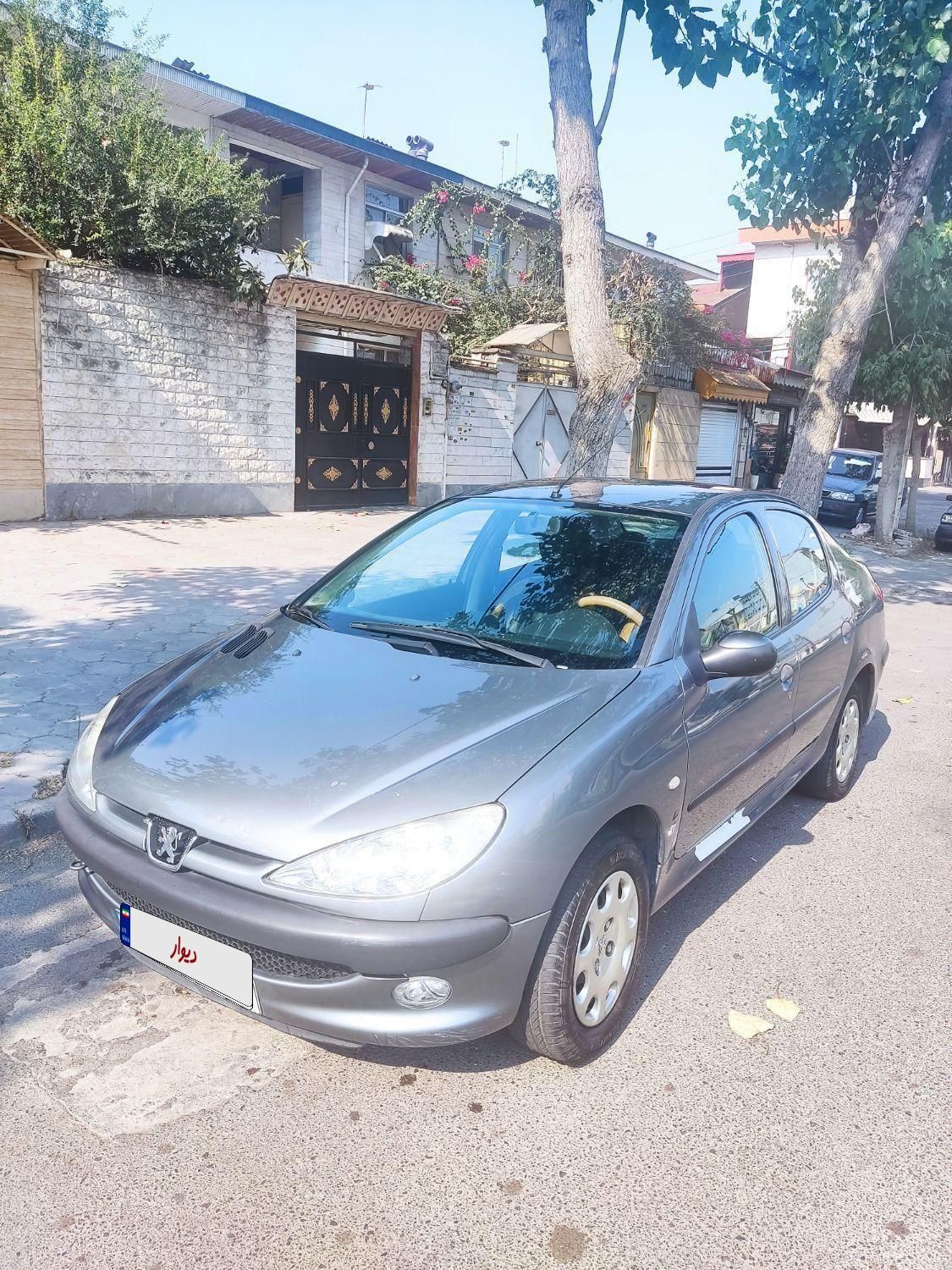 پژو ۲۰۶ صندوق دار v8 - 1398