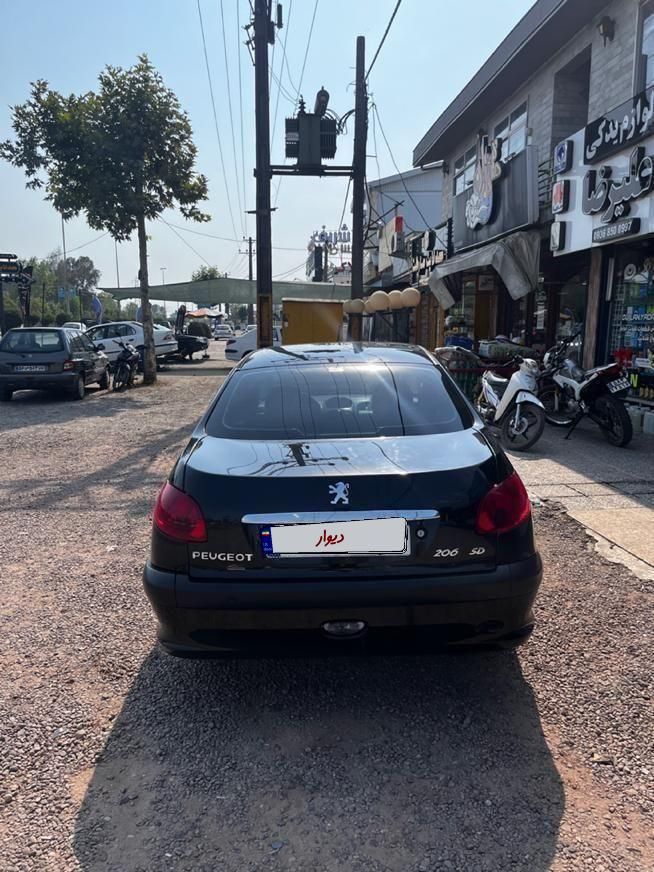 پژو ۲۰۶ صندوق دار v8 - 1397