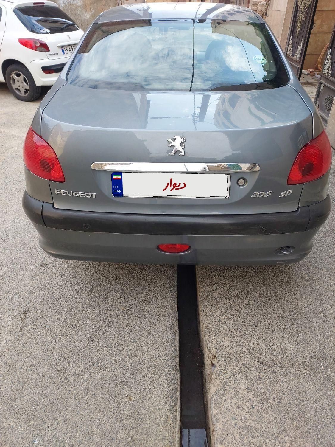 پژو ۲۰۶ صندوق دار v8 - 1394