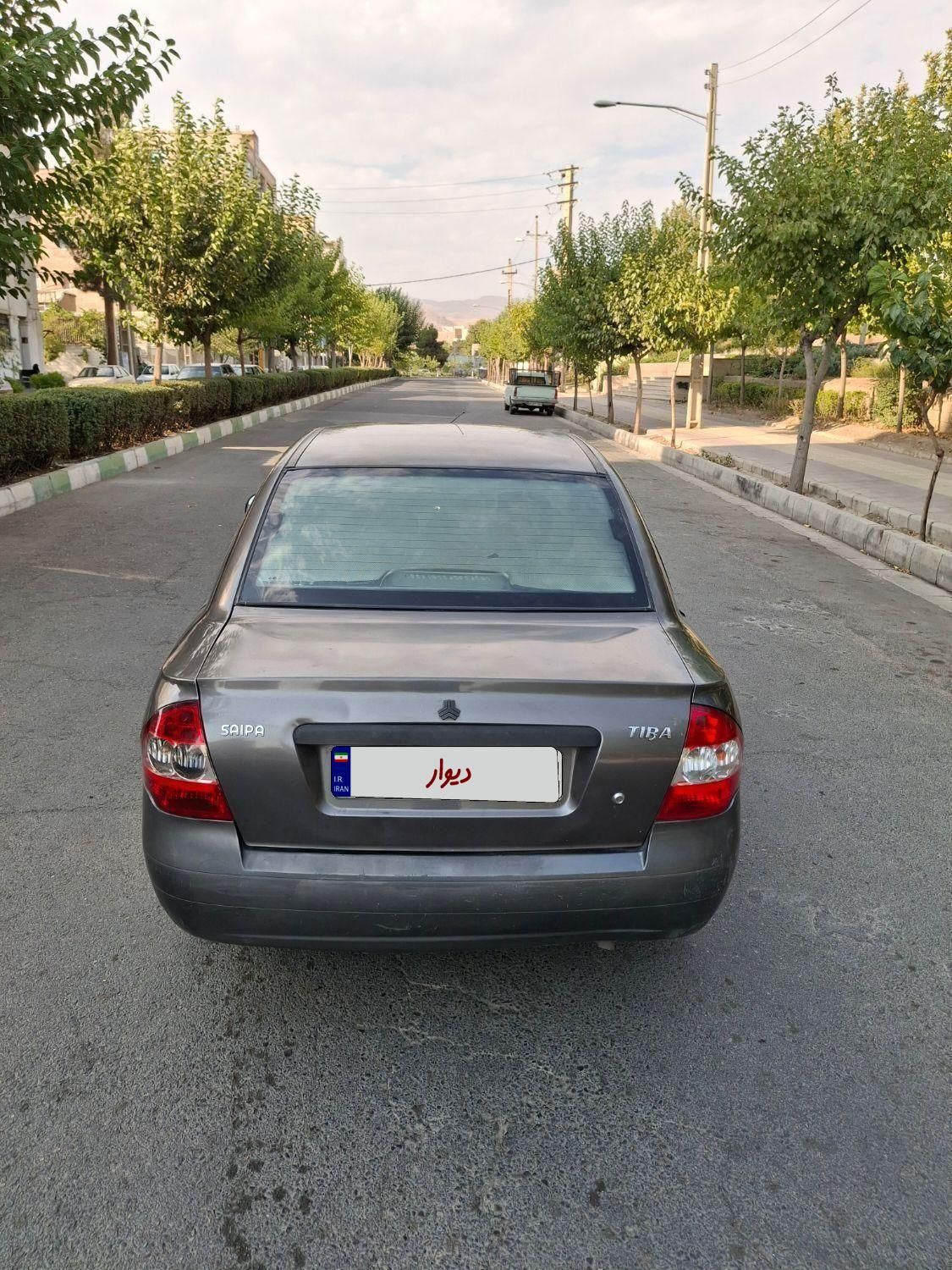 تیبا صندوق دار SX - 1391