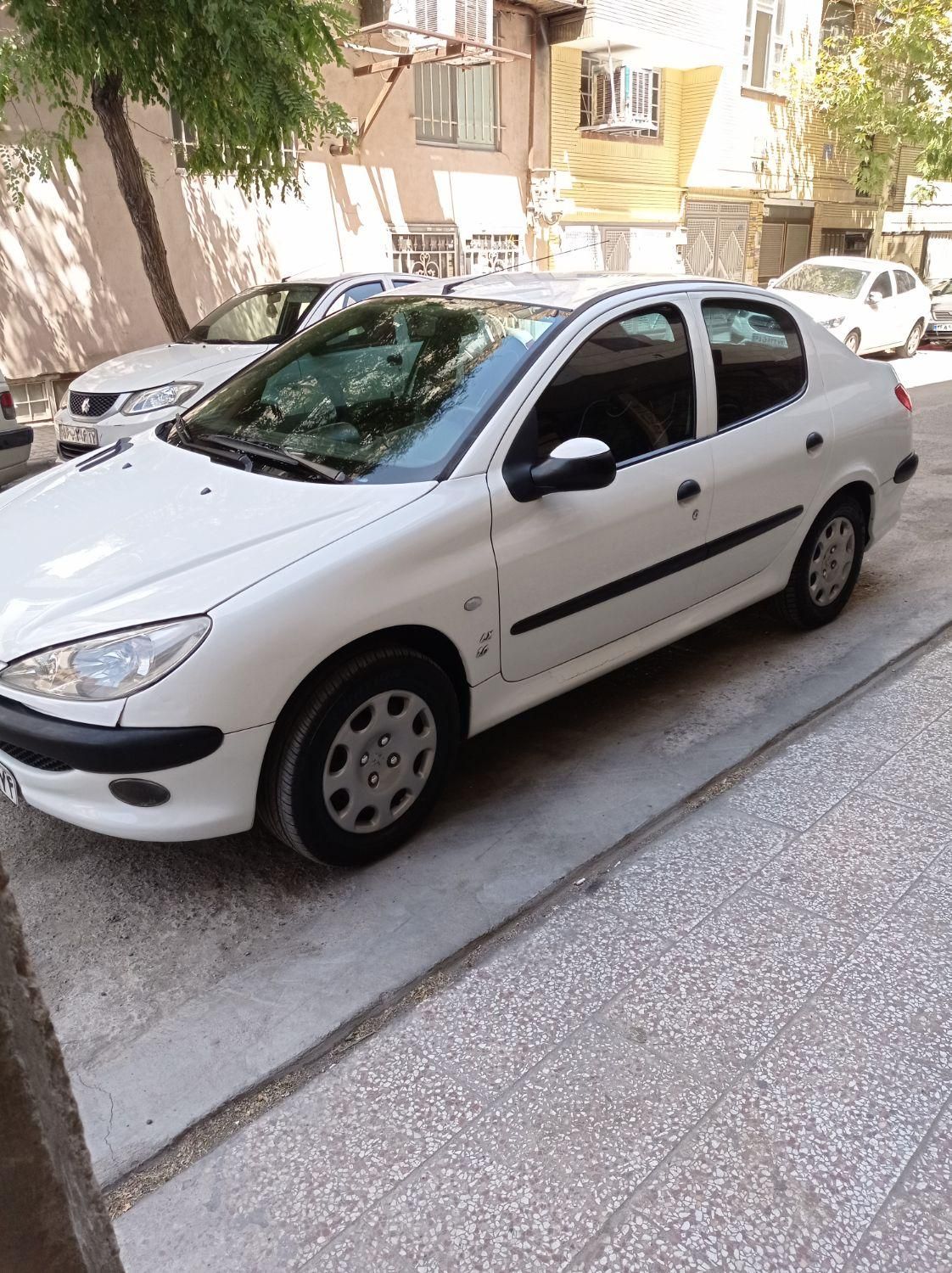 پژو ۲۰۶ صندوق دار v8 - 1394