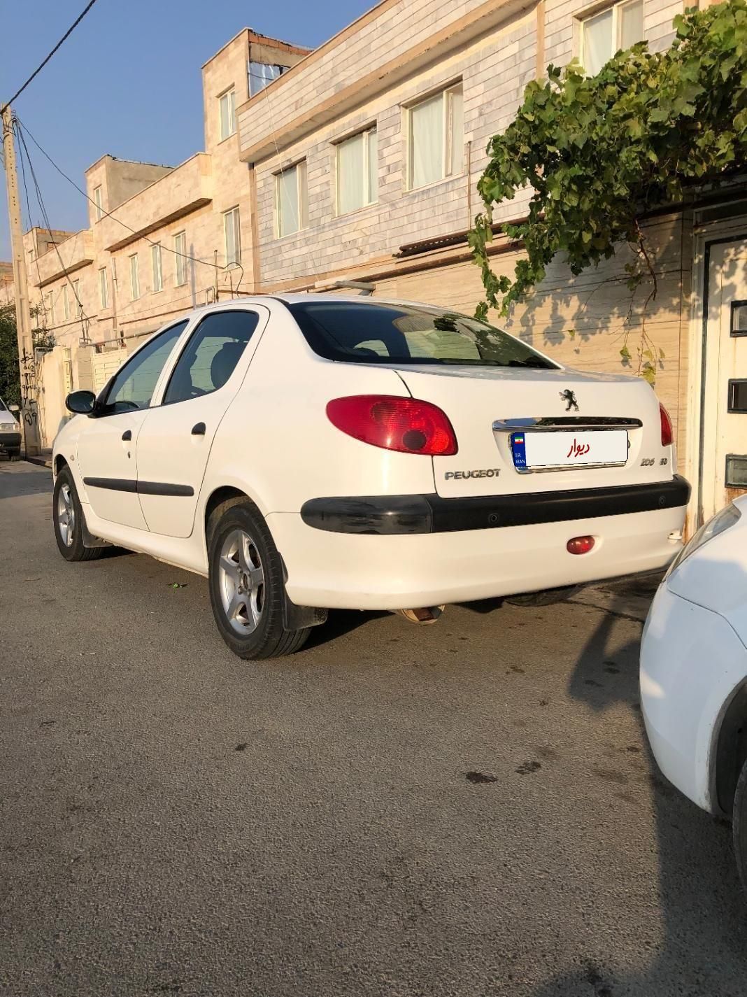 پژو ۲۰۶ صندوق دار v8 - 1394