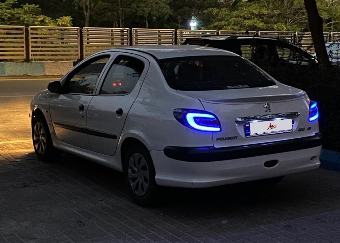 پژو ۲۰۶ صندوق دار v8 - 1394