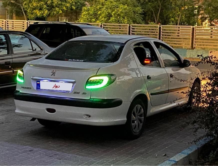 پژو ۲۰۶ صندوق دار v8 - 1394