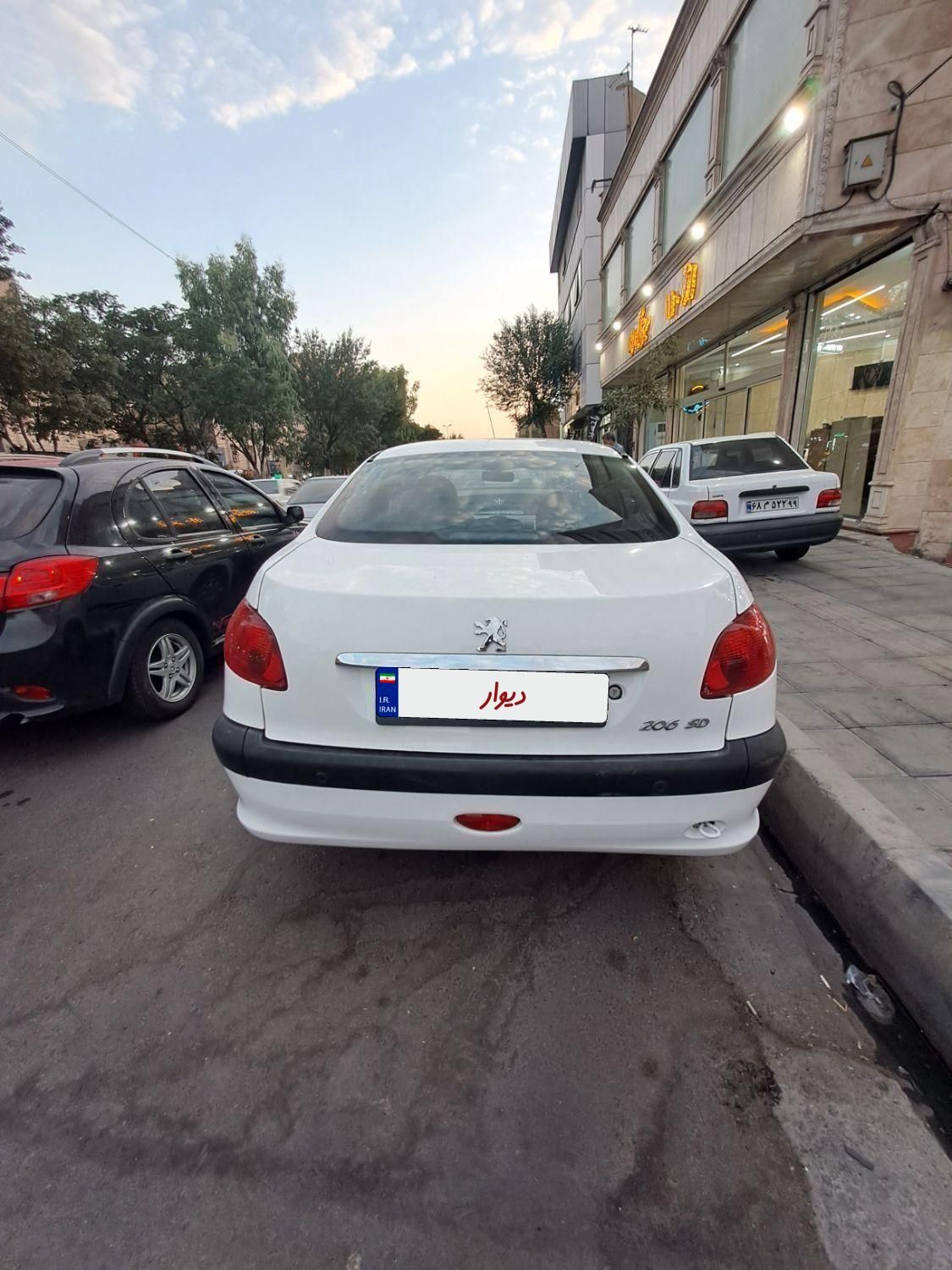 پژو ۲۰۶ صندوق دار v8 - 1397