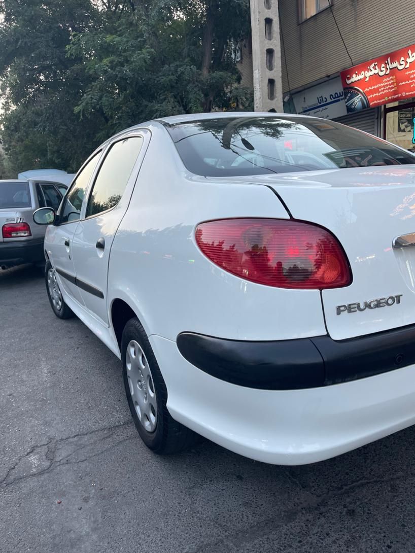 پژو ۲۰۶ صندوق دار v8 - 1395