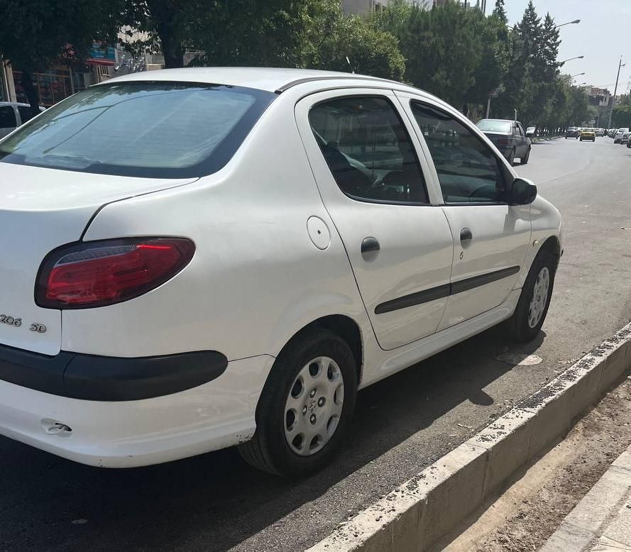پژو ۲۰۶ صندوق دار v8 - 1391