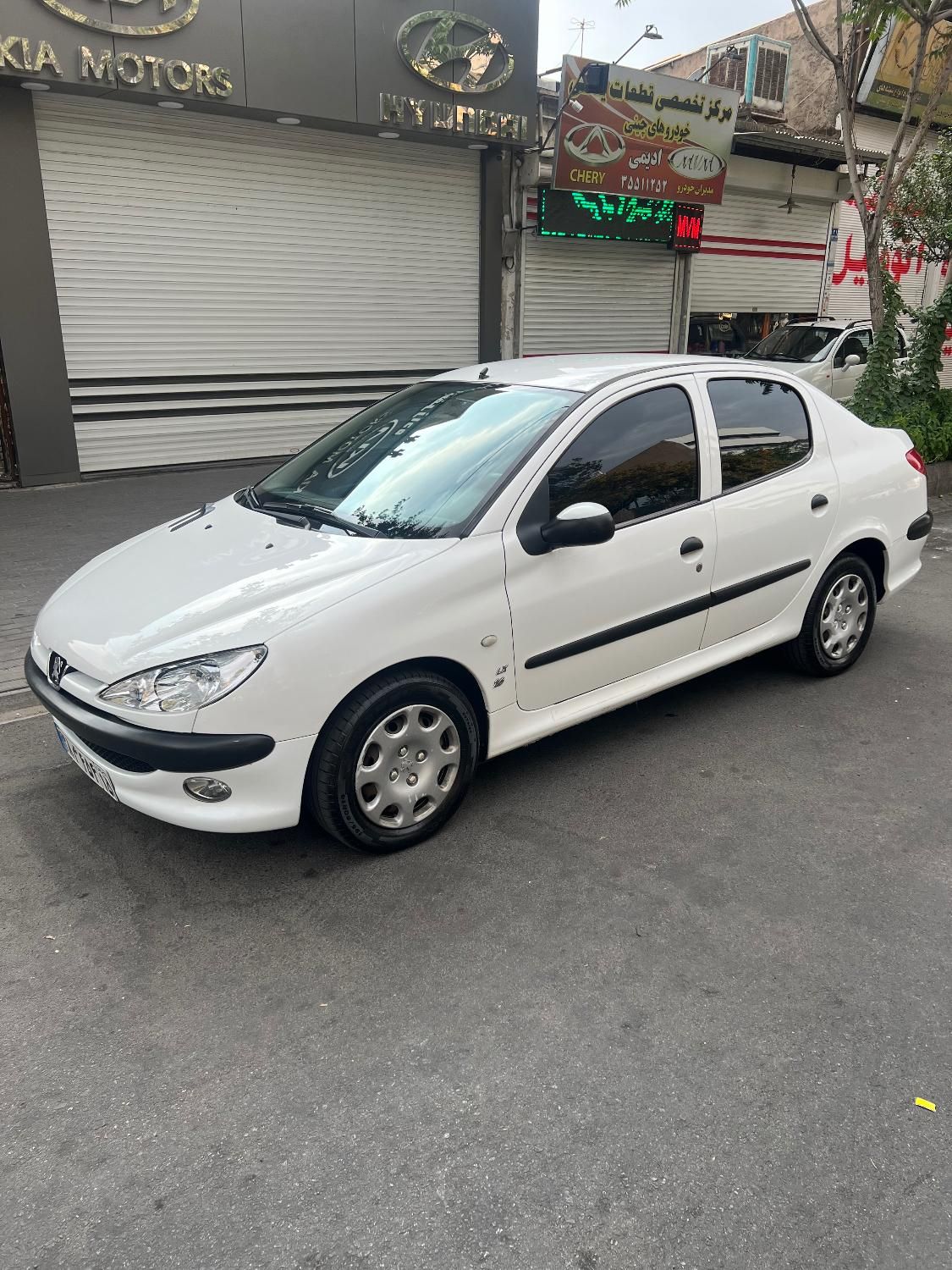 پژو ۲۰۶ صندوق دار v8 - 1394