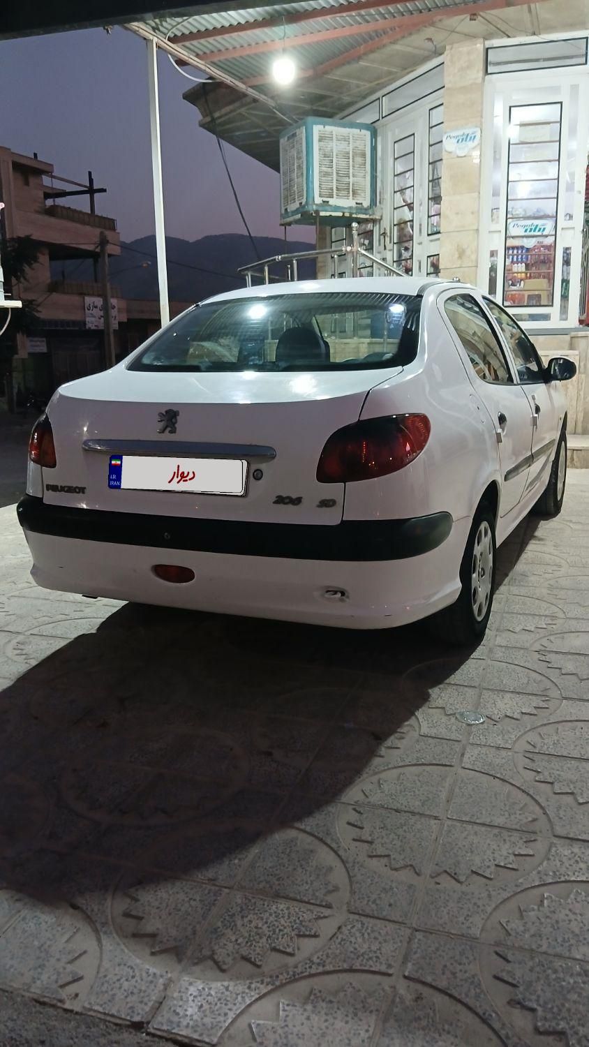 پژو ۲۰۶ صندوق دار v8 - 1394