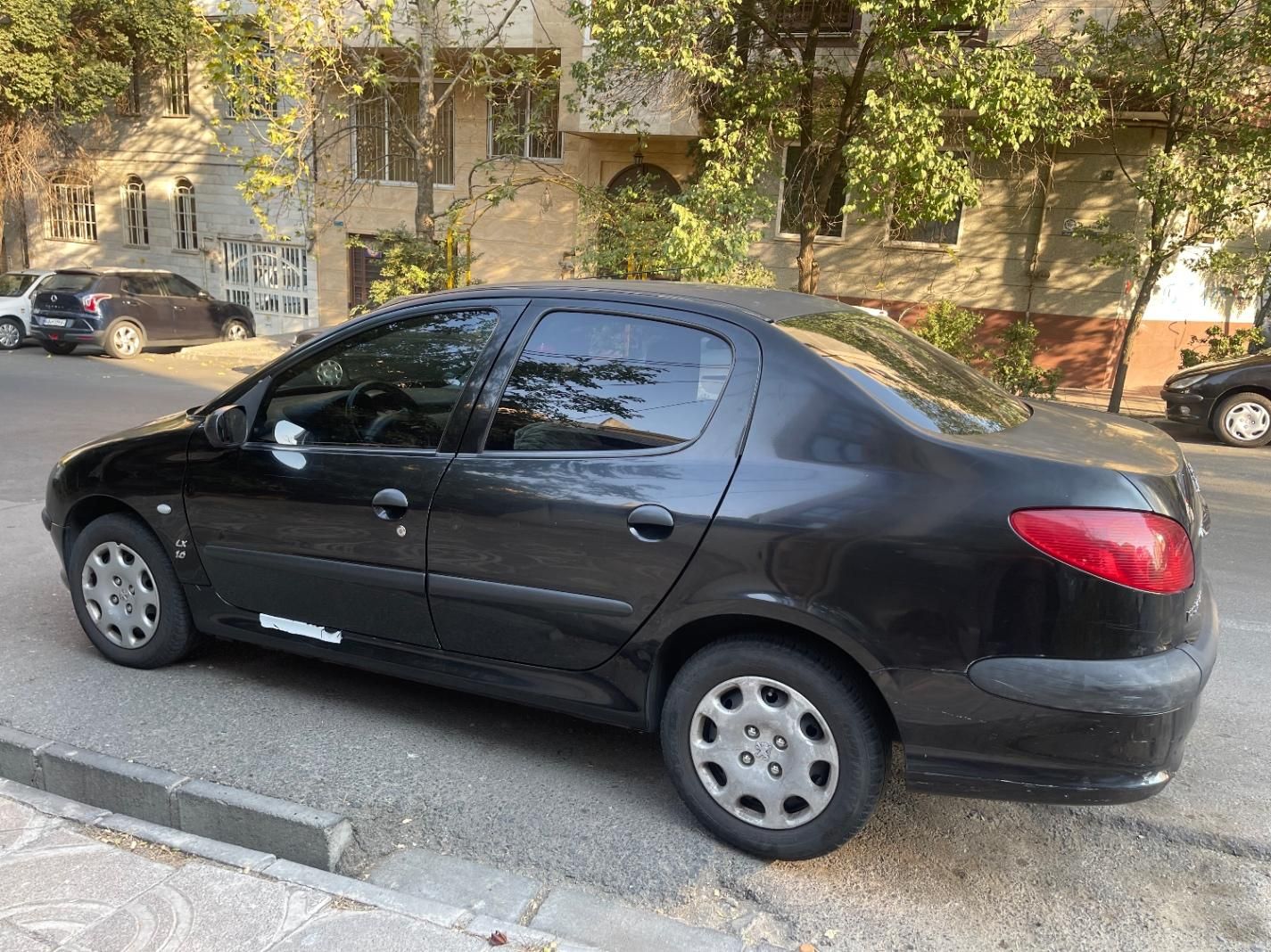 پژو ۲۰۶ صندوق دار v8 - 1394