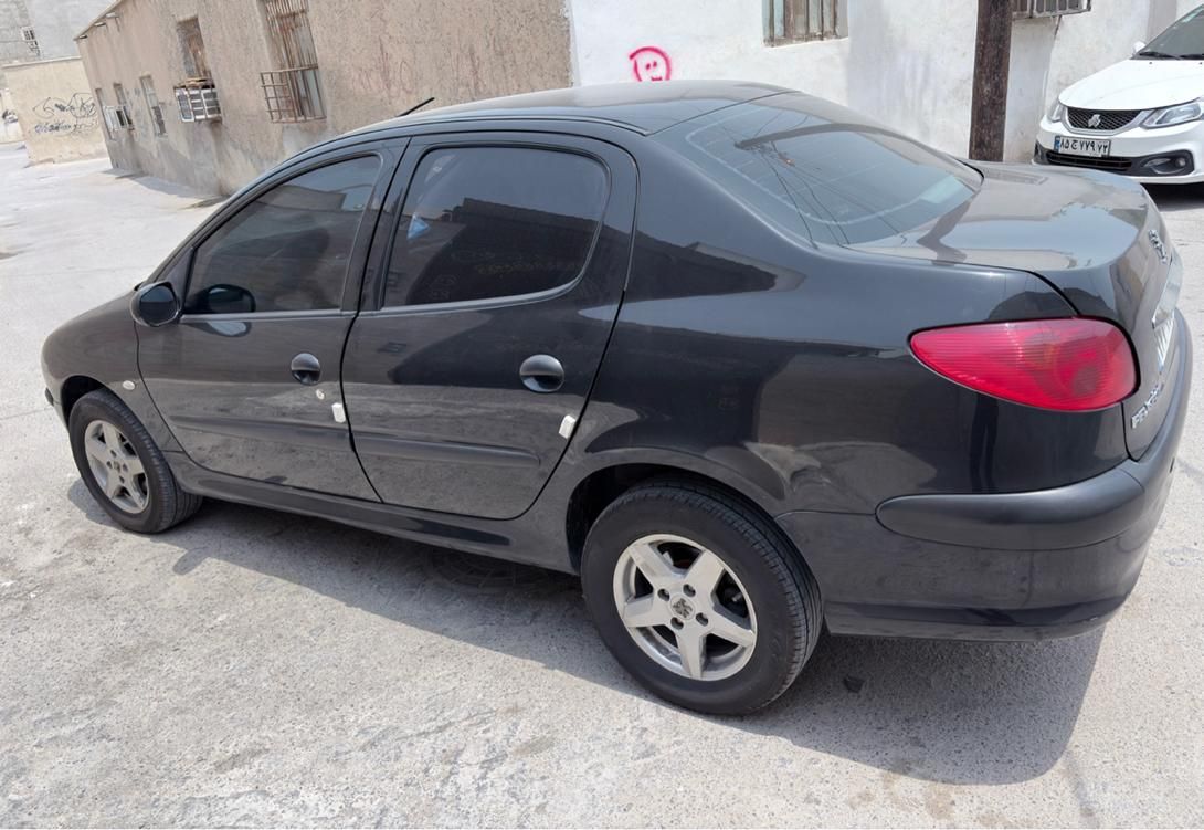 پژو ۲۰۶ صندوق دار v8 - 1397