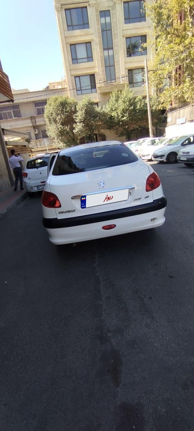 پژو ۲۰۶ صندوق دار v8 - 1395