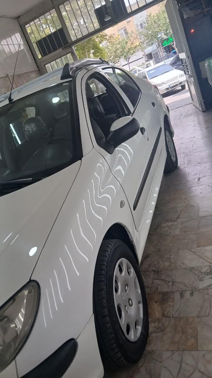 پژو ۲۰۶ صندوق دار v8 - 1395
