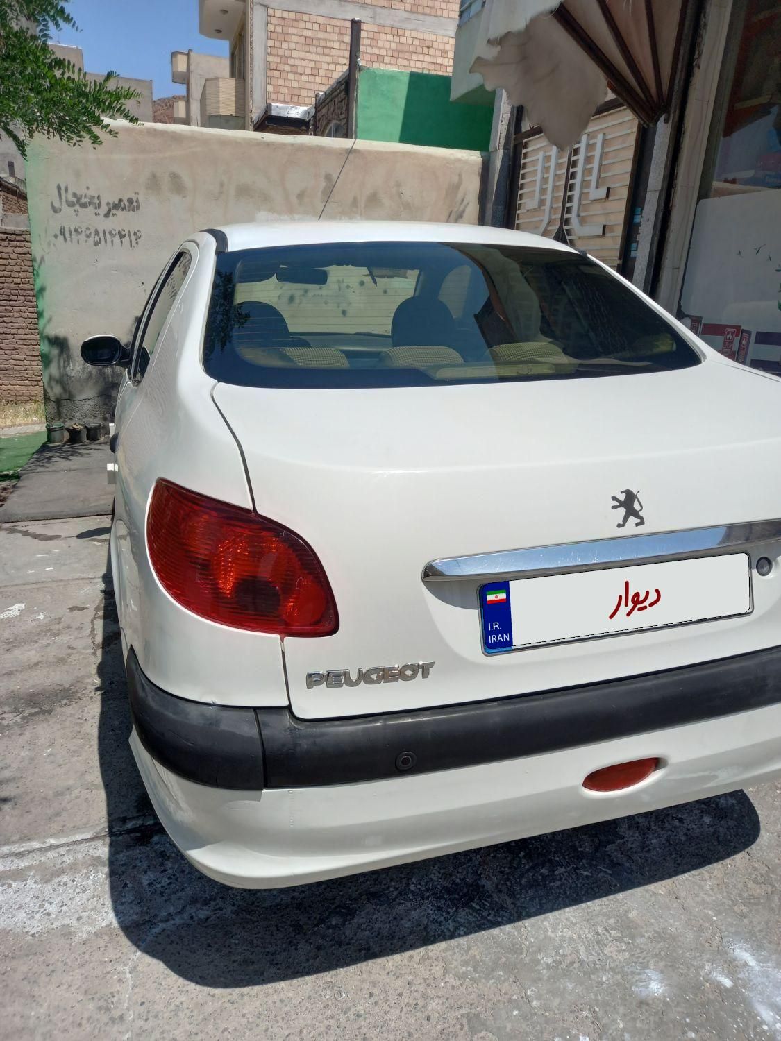 پژو ۲۰۶ صندوق دار v8 - 1392