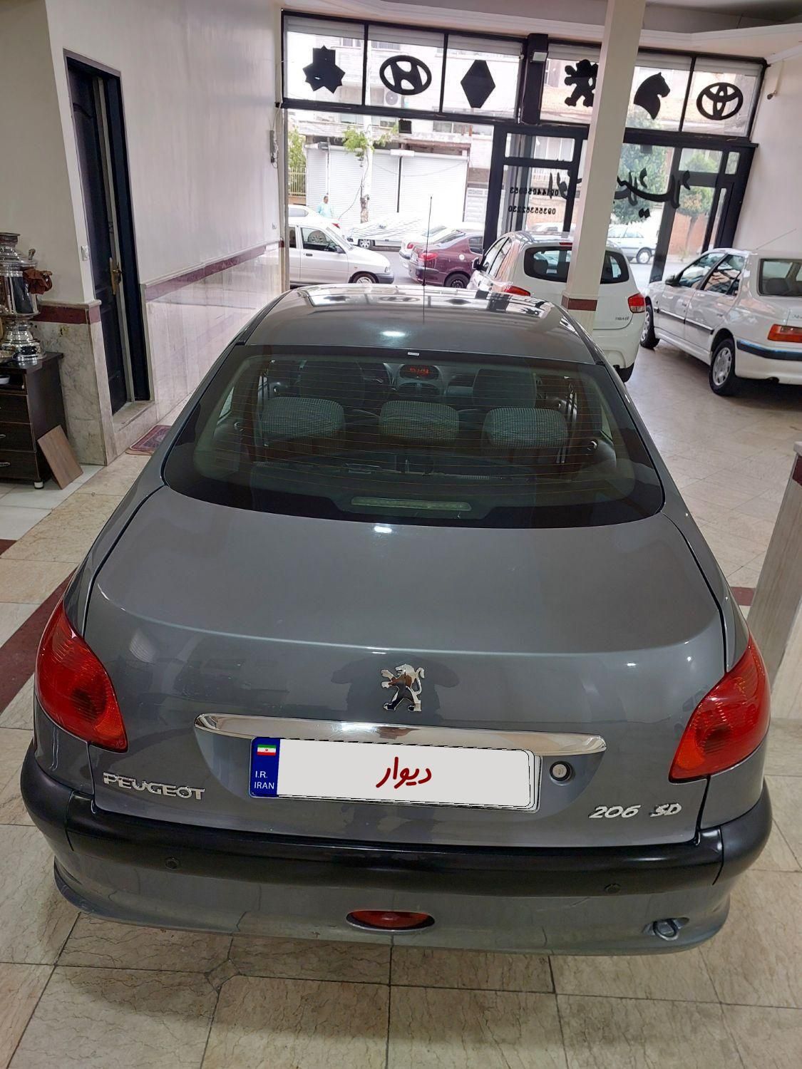 پژو ۲۰۶ صندوق دار v8 - 1394
