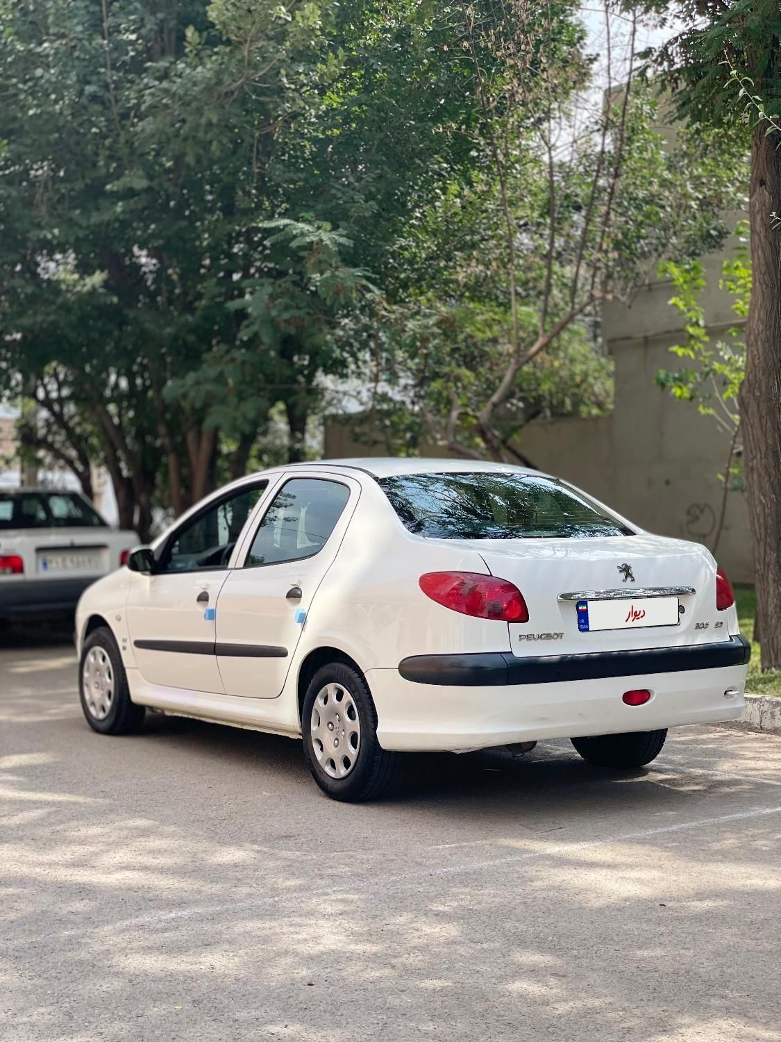 پژو ۲۰۶ صندوق دار v8 - 1396
