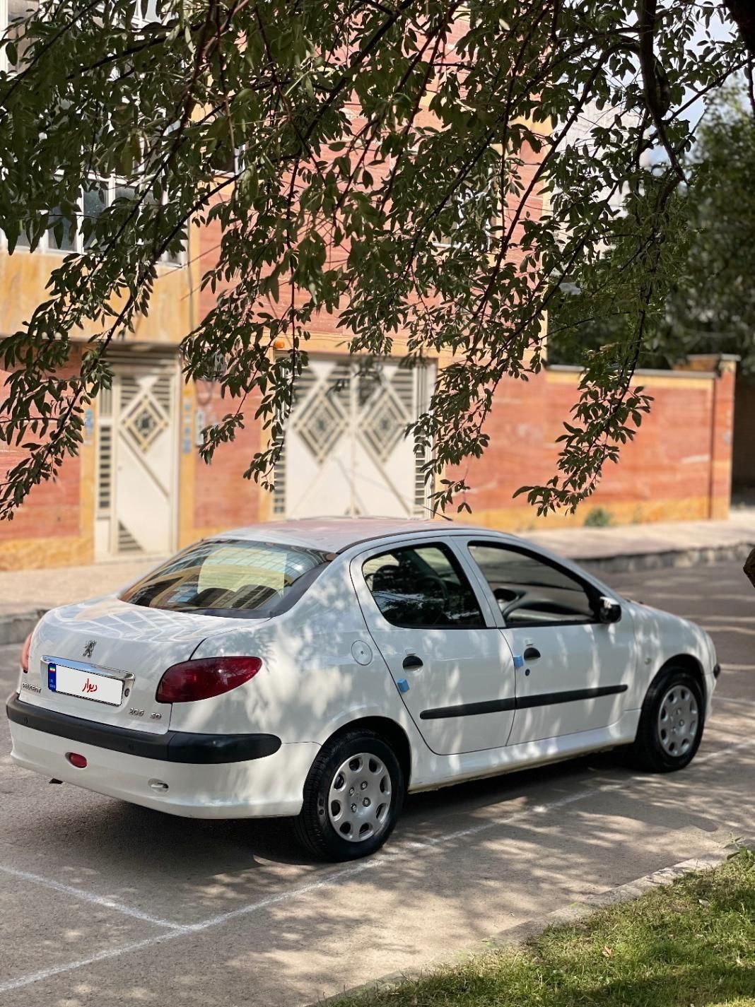 پژو ۲۰۶ صندوق دار v8 - 1396