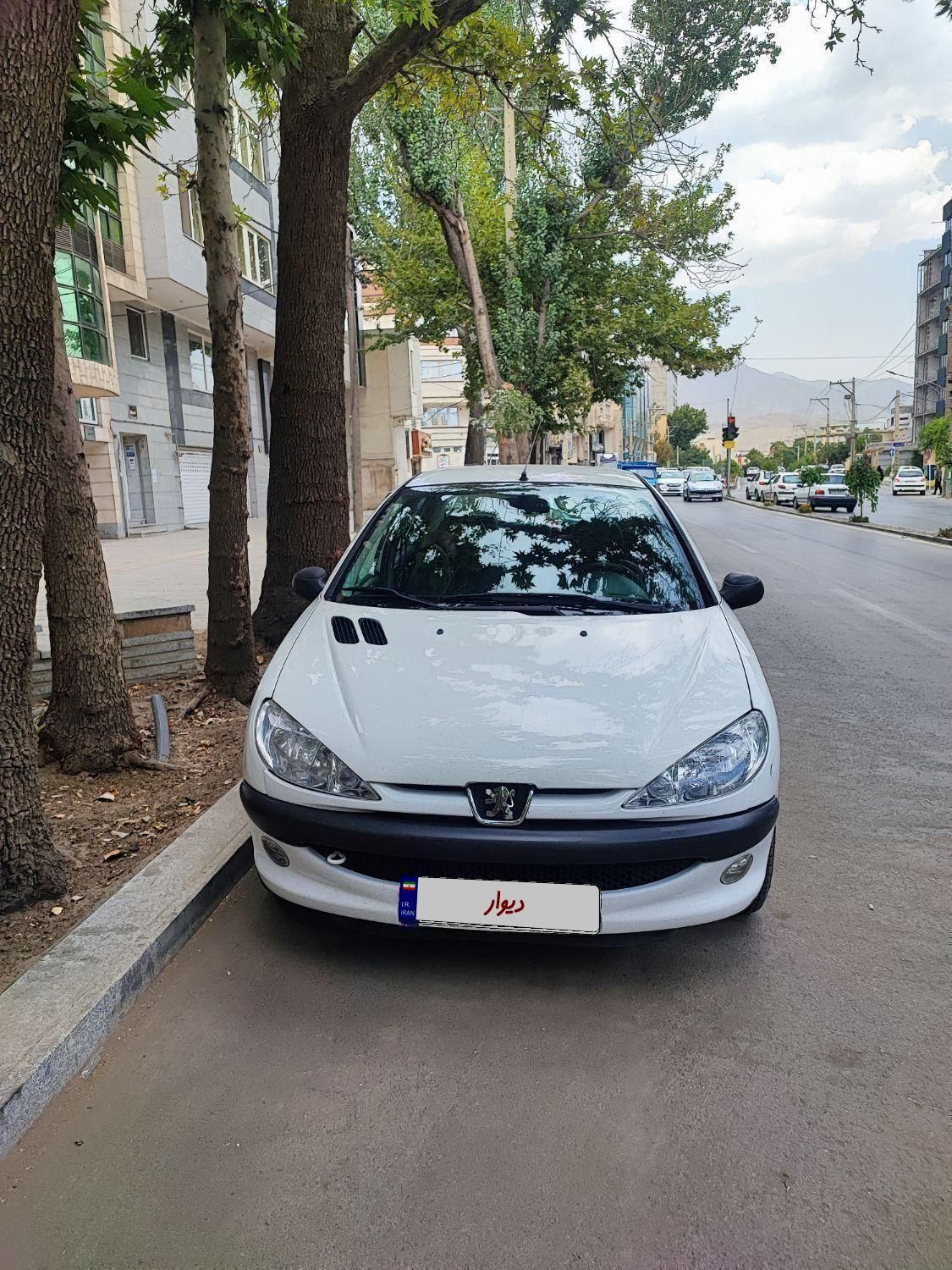 پژو ۲۰۶ صندوق دار v8 - 1394