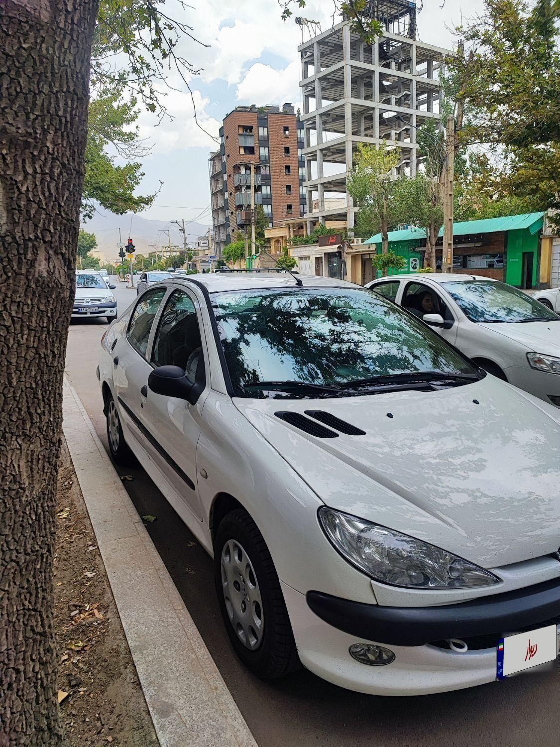 پژو ۲۰۶ صندوق دار v8 - 1394