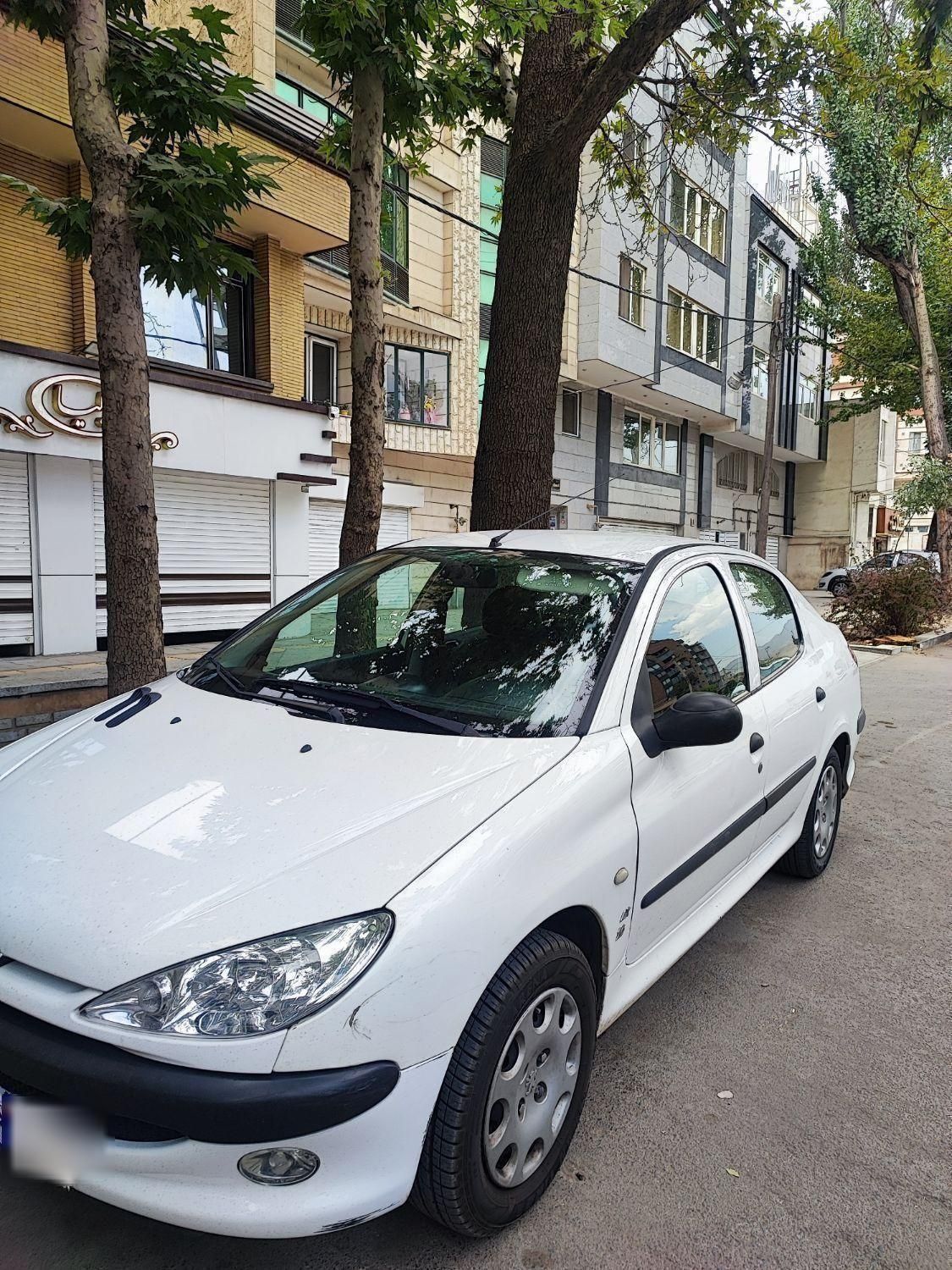 پژو ۲۰۶ صندوق دار v8 - 1394
